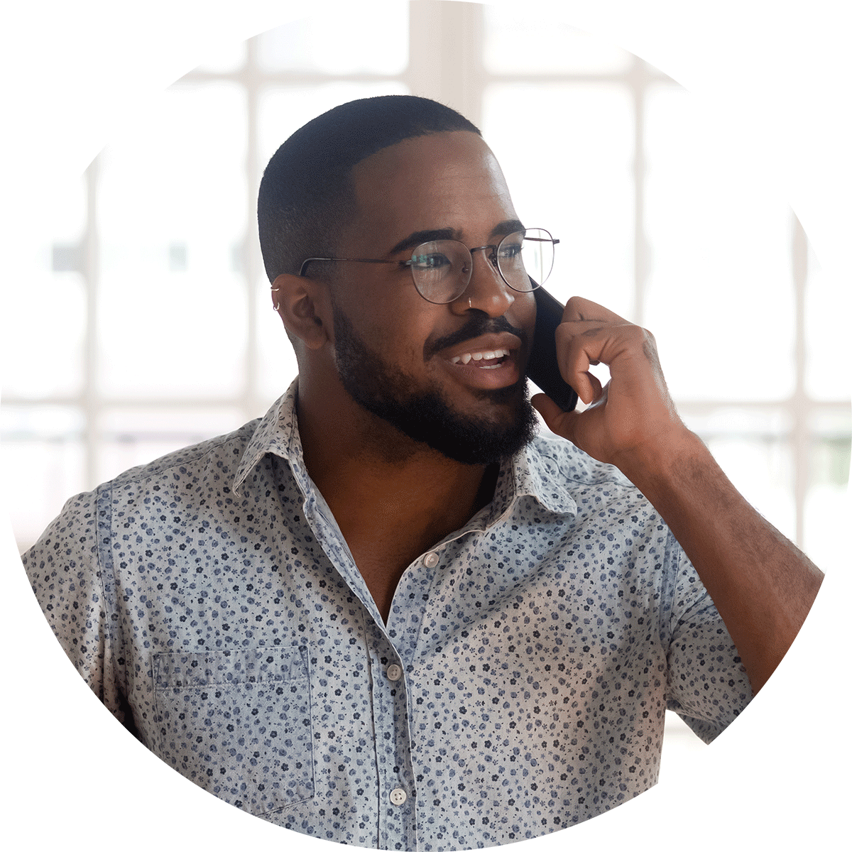 photo of a man talking on the phone